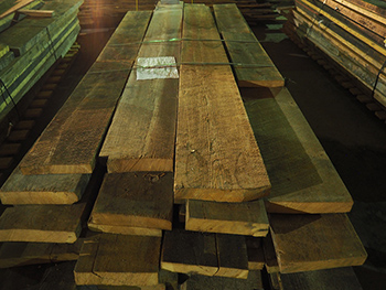 Figure 5. Original 1880s joists from the 2016 Tech Tower renovation. They were salvaged when an interior fire stair was cut into the building to replace the exterior fire escapes.  These joists will be used to build the stair treads at the Kendeda Building.